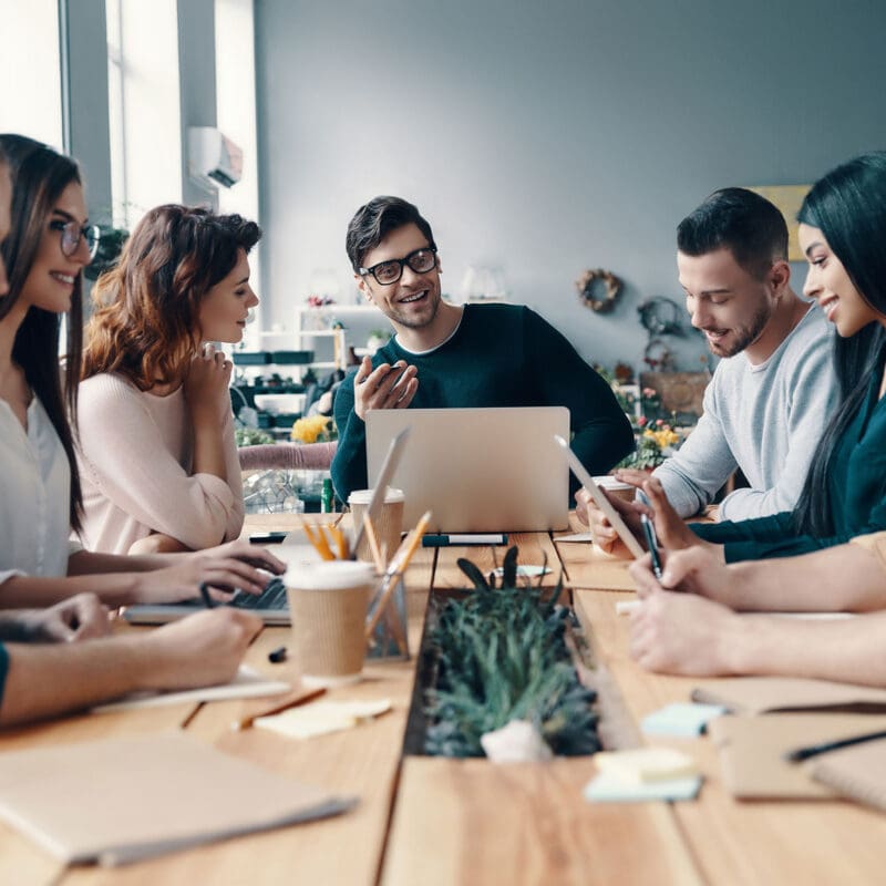 Business team working together meeting in a boardroom