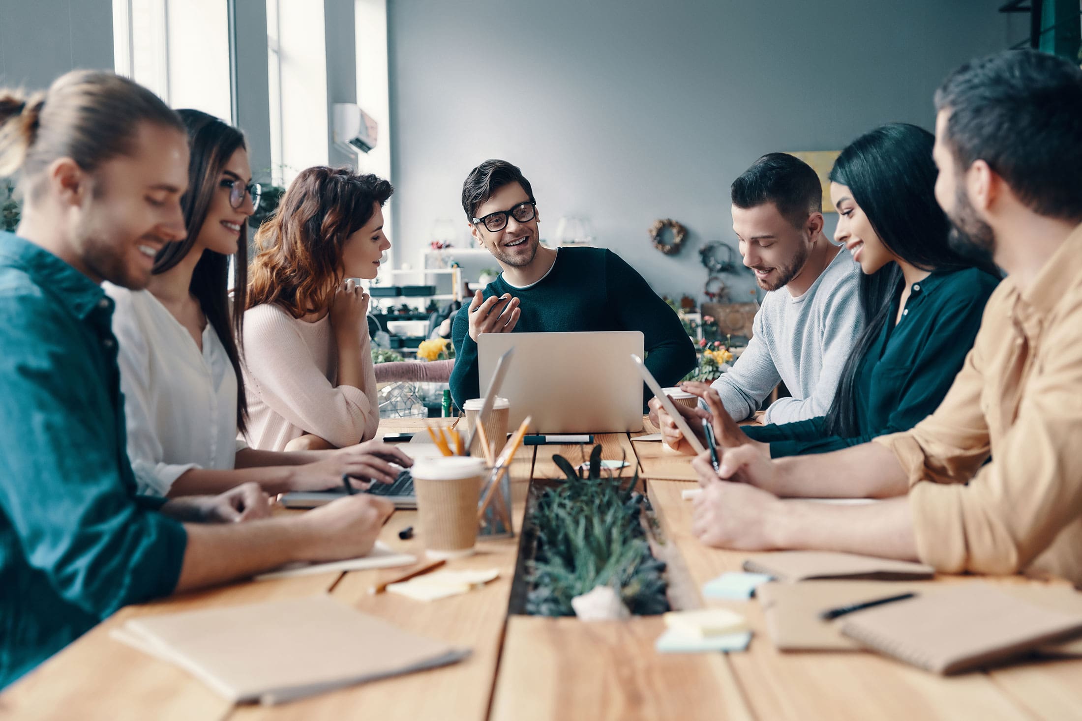 Business team working together meeting in a boardroom