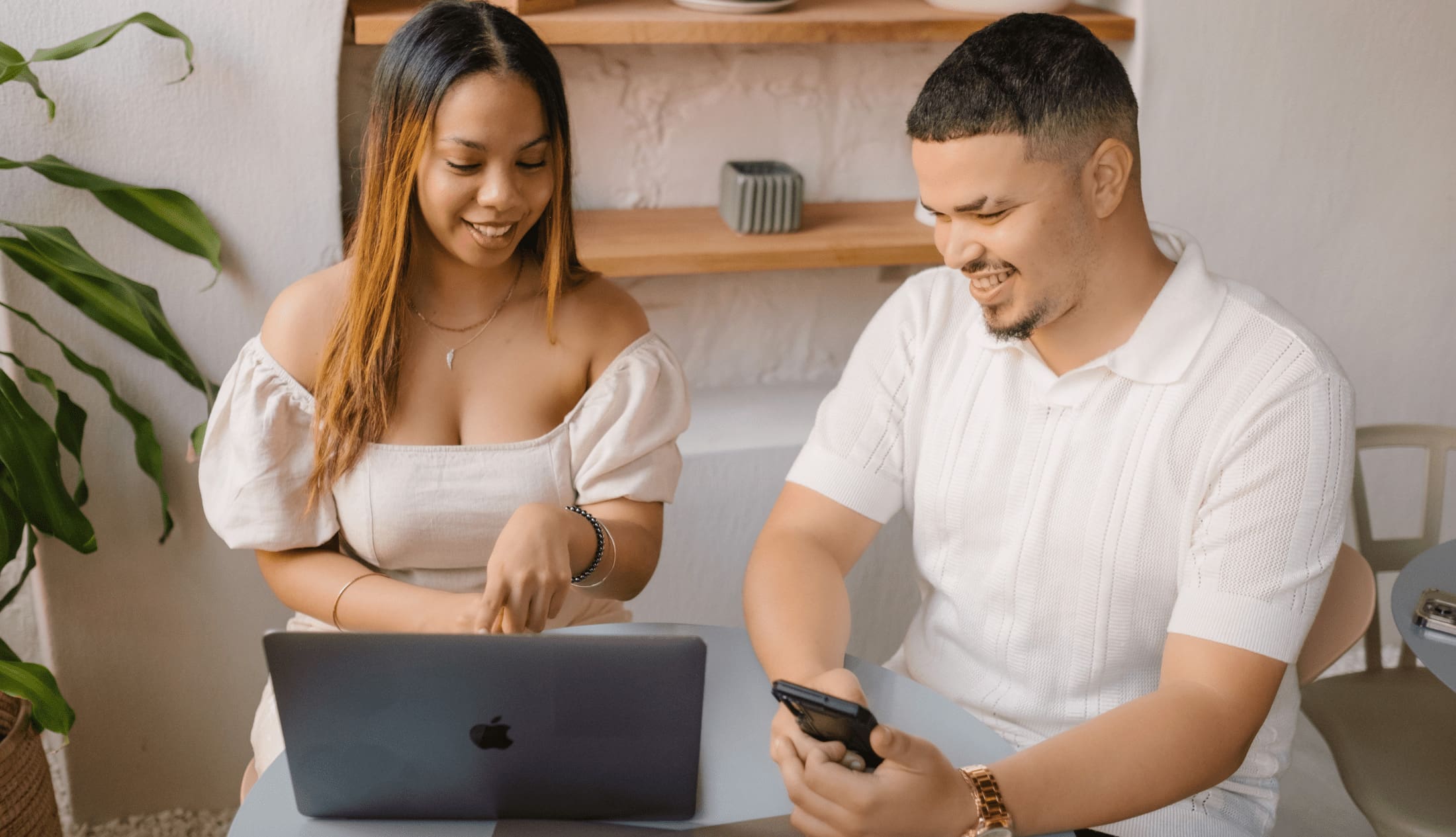 A graphics designer and website developer that work for a boutique agency, discuss how to work on the branding of a client