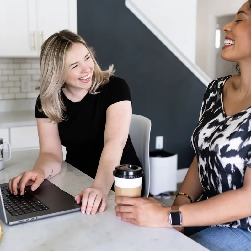 Team collaborating on logistics website development and digital strategy in a relaxed working environment