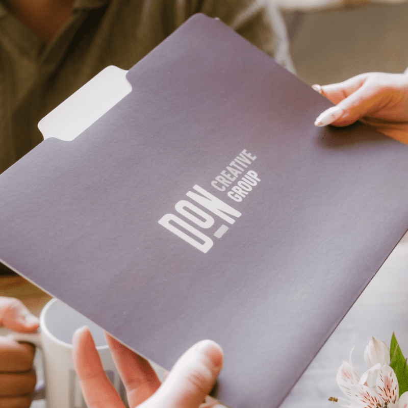 Logistics logo displayed on branded materials during logistics website development planning