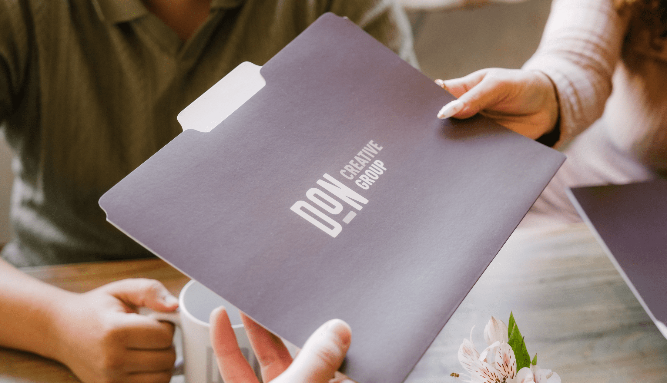 Logistics logo displayed on branded materials during logistics website development planning