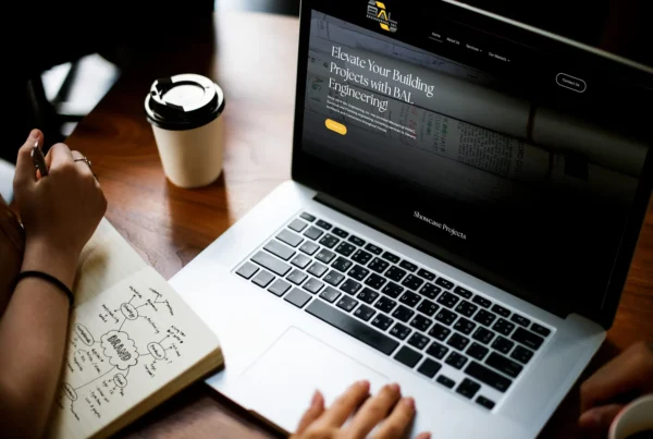 Professional reviewing engineering website while planning brand strategy and project concepts