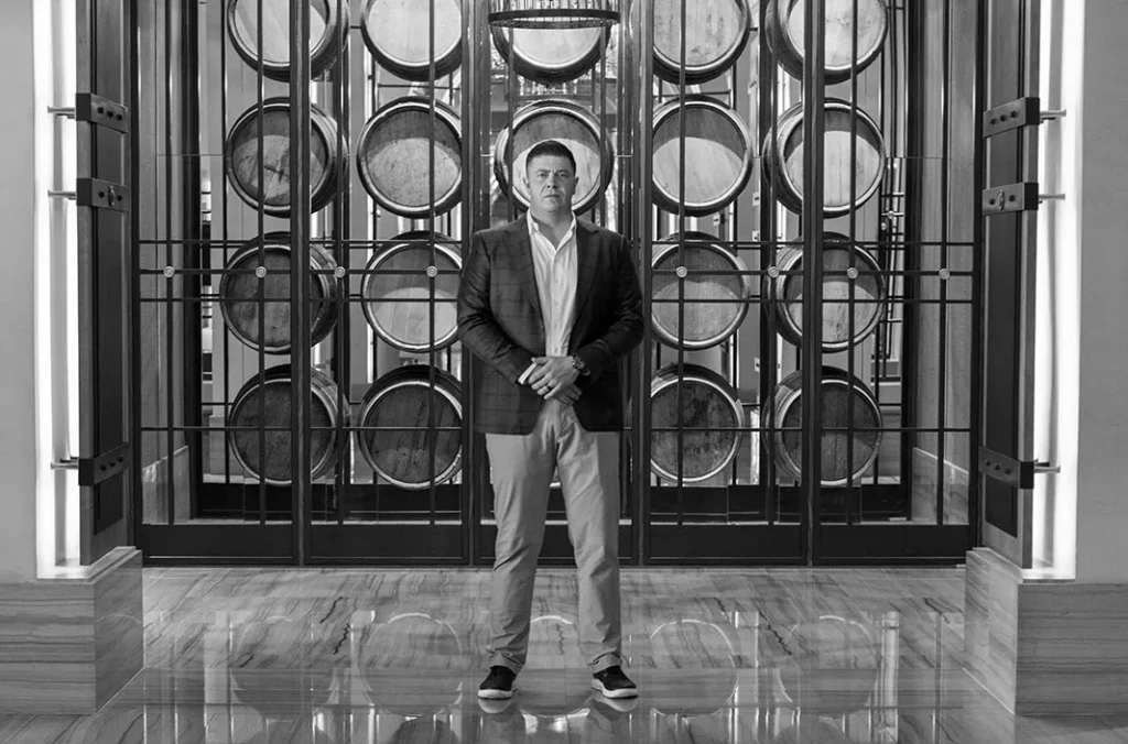 Professional Leadership Portrait in Modern Space Professional man standing confidently in a modern architectural interior