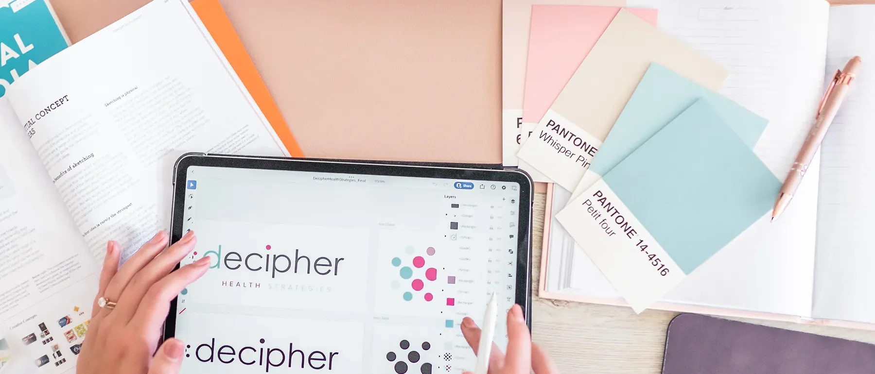 Web design for logistics companies shown through a creative planning workspace with digital brand and website layout development