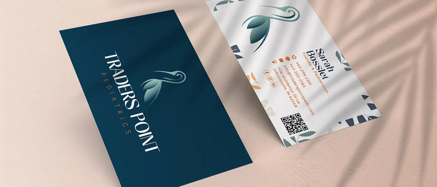 Traders Point Pediatrics business card design showing front and back with logo and contact details
