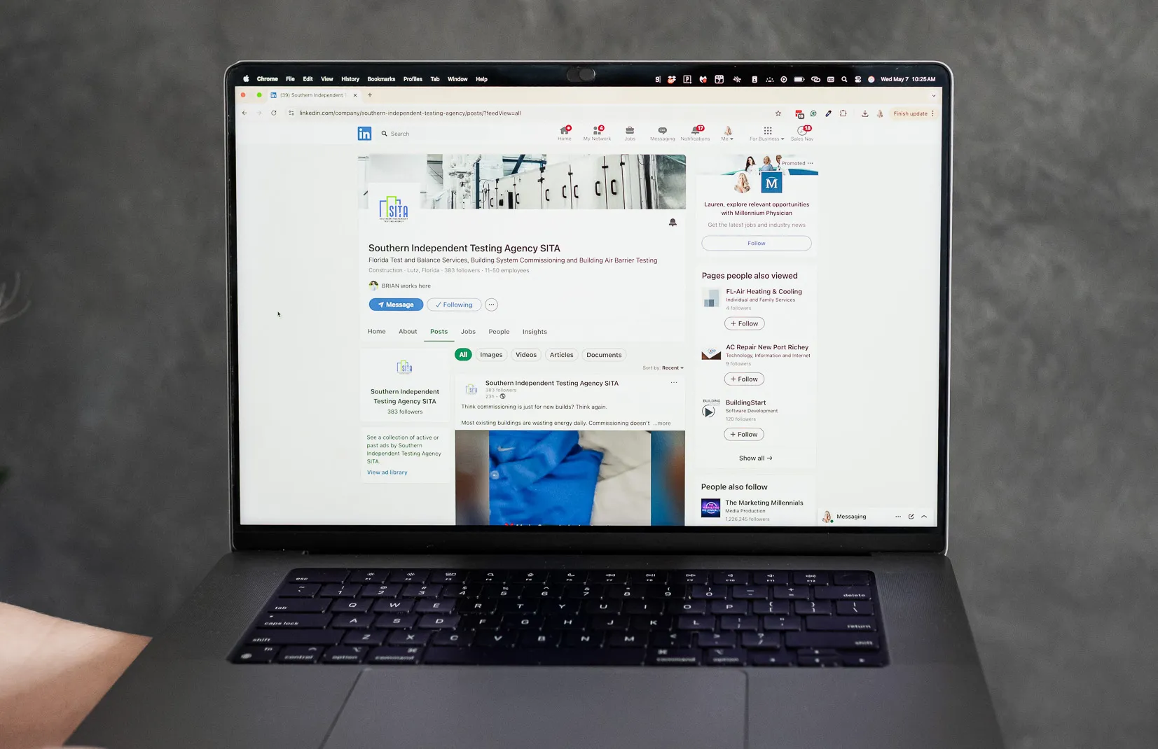 Laptop displaying a LinkedIn company page and post analytics, representing social media updates, content strategy planning, and professional platform engagement